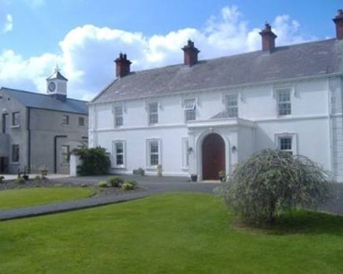 Flatfield House & Clock Tower Coaching Apartments in Lisburn 