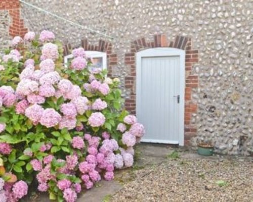 Flint Cottage in Beeston Common